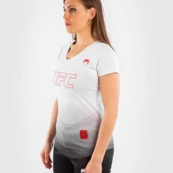 UFC Venum Authentic Fight Week 2 Women's Short Sleeve T-shirt - White -Venum store 1 252F1 252F4 252Ff 252F114f68b609c0dd7e800b8be8c07f63c25ba06078 VNMUFC 00076 002 02 ee75b763 0648 43cb 80bd dcfee183021c