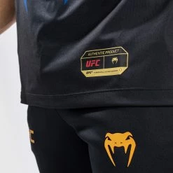 CSD FASHION UFC AUTHENTIC FIGHT NIGHT 2.0 KIT BY VENUM MEN'S WALKOUT JERSEY - Midnight - Champion 15 CSD FASHION UFC AUTHENTIC FIGHT NIGHT 2.0 KIT BY VENUM MEN'S WALKOUT JERSEY - Midnight - Champion -Venum store 1 252F8 252F3 252F6 252F1836d455c39398cdfe3a02d9bb5e3b6ff72b4885 VNMUFC 08 1