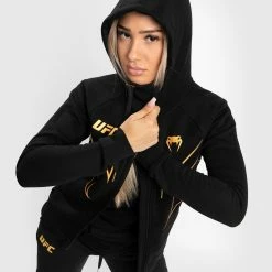 UFC Venum Fight Night 2.0 Replica Women's Full Zip Hoodie - Champion 11 UFC Venum Fight Night 2.0 Replica Women's Full Zip Hoodie - Champion -Venum store 3 252F5 252F6 252Fc 252F356c1d8da37cd2a0067e8e9b001ef8fcd2c3e8e4 VNMUFC 00151 126 07