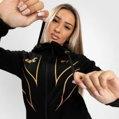 UFC Venum Fight Night 2.0 Replica Women's Full Zip Hoodie - Champion 10 UFC Venum Fight Night 2.0 Replica Women's Full Zip Hoodie - Champion -Venum store 3 252F8 252F5 252Fa 252F385ad1eece5ec4e49a5ff64cab88c9c8b96f5a5a VNMUFC 00151 126 01