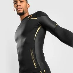 Venum Tempest 2.0 Rashguard Long Sleeves - Black/Gold 8 Venum Tempest 2.0 Rashguard Long Sleeves - Black/Gold -Venum store b 252F9 252F5 252F7 252Fb95722107ceafc0c82bed48f897860f45c60f1df RASHGUARDS LS TEMPEST2.0 BLACK GOLD 07 1ebd9f69 85d9 495d 8def 41fd93ecaaa3